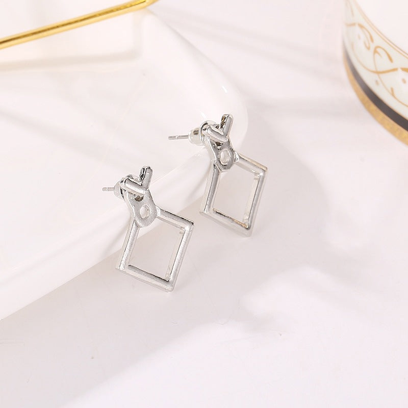 Simple golden geometric metal earrings